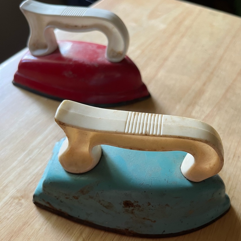Vintage child’s toy play irons